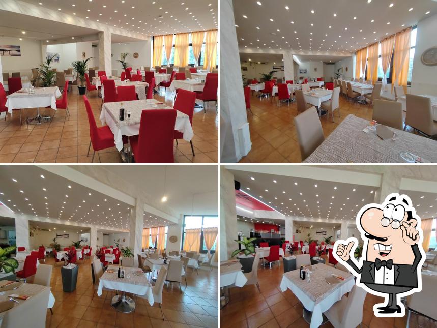 Siediti a un tavolo di Ristorante Pizzeria - Al Maniero “FUSION”