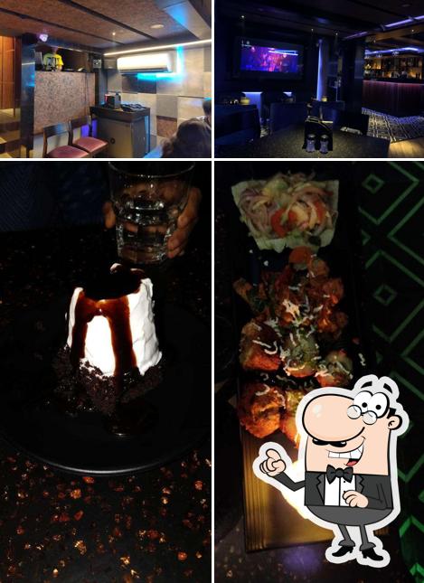 This is the image depicting interior and food at 36 Downtown - Restobar