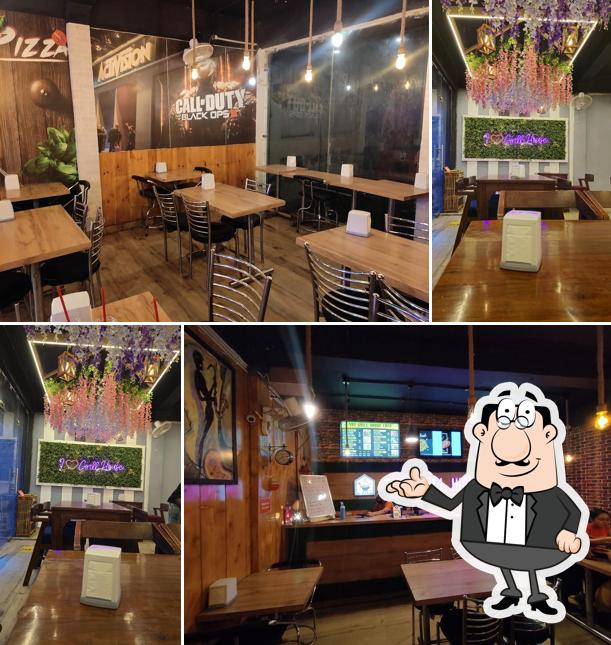 Take a seat at one of the tables at The Grill House Cafe