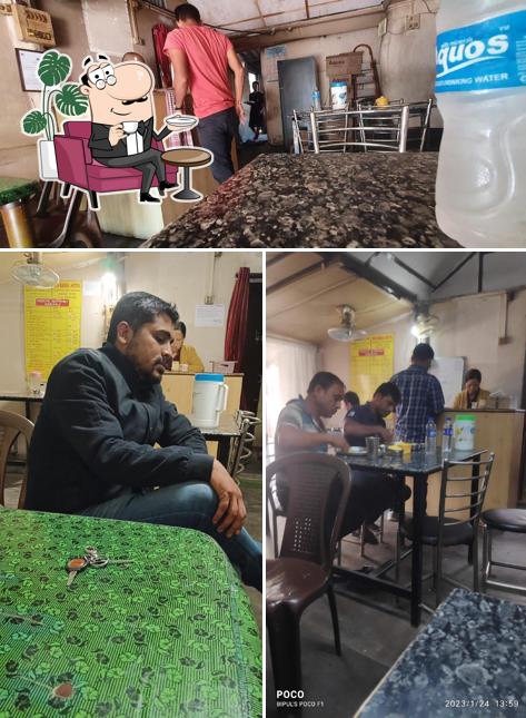 Take a seat at one of the tables at Babul Hotel (Gohain Pork)
