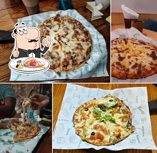 Get pizza at Downtown Cafe
