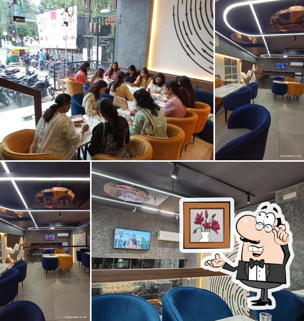 Check out how Munch N Mime - Restaurant N Cafe, at Geeta Bhawan Square looks inside