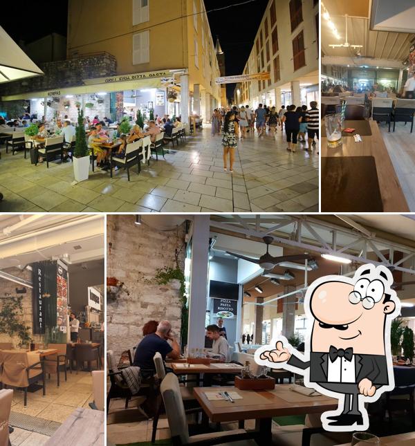 Siediti a un tavolo di Restaurant Kompas