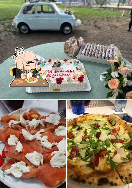 Rafiki Bar Pizzeria si caratterizza per la cibo e esterno