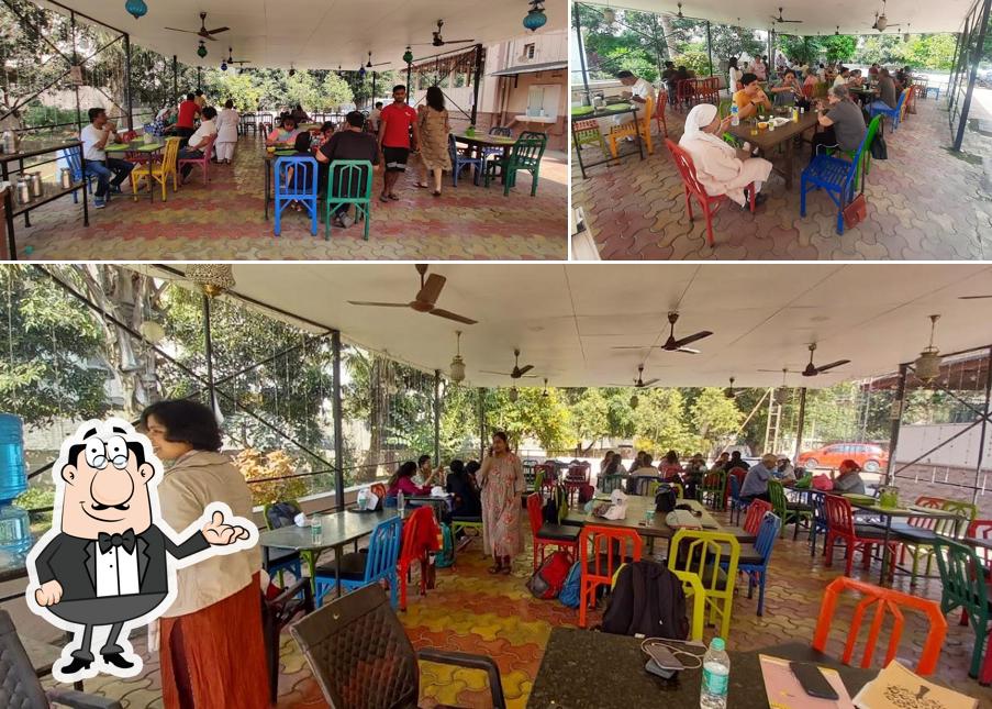 Take a seat at one of the tables at Cafe Farohar