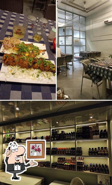 This is the photo depicting interior and food at Swara Executive Restro & Bar