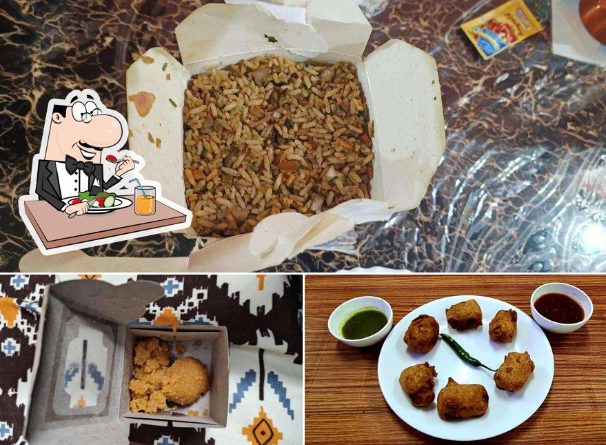 Check out the picture displaying food and interior at Taste Indies
