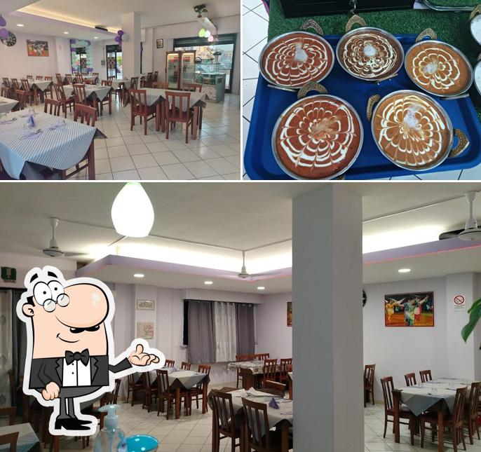 Dai un’occhiata alla foto che raffigura la interni e cibo di Haveli ristorante indiano