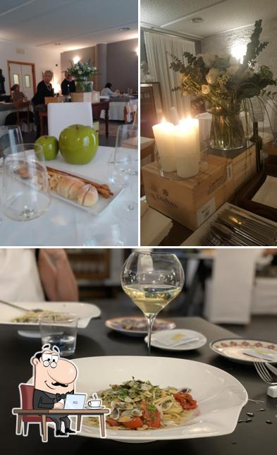 La foto di interni e tavolo da pranzo da Ravecca