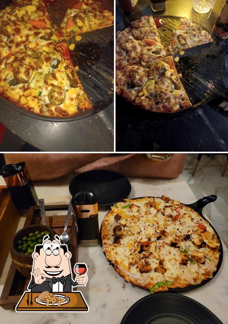 Order pizza at Four Brothers Brewing - Restrobar Club Microbrewery