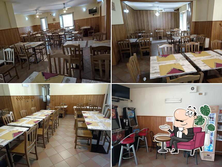 Siediti a un tavolo di Trattoria La Sosta