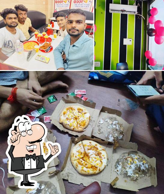 Take a seat at one of the tables at U.S. Pizza Cafe