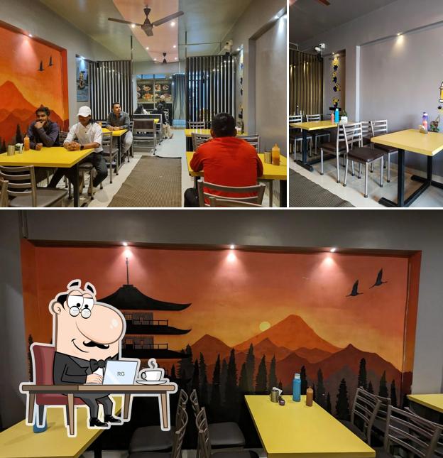 Take a seat at one of the tables at ShindeShahi Chinese Resto