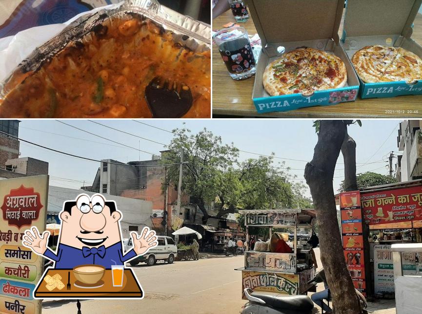 Take a look at the image depicting food and exterior at The Pizza World