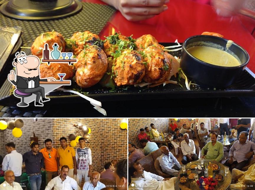 Check out the picture depicting interior and food at Puvika Cafe