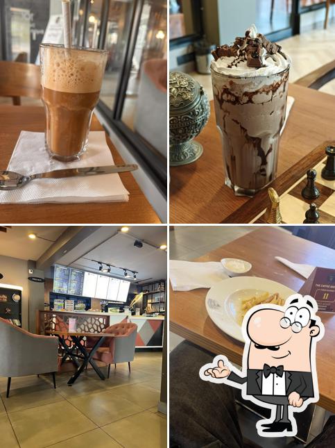 Take a look at the picture showing interior and drink at Coffee Brewery - HRBR Layout