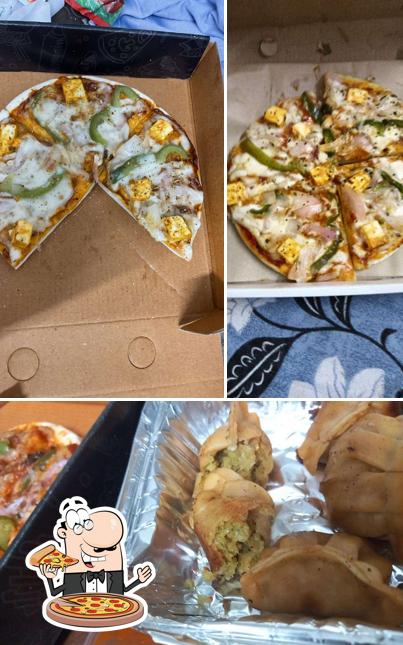 Try out pizza at Pizza Castle