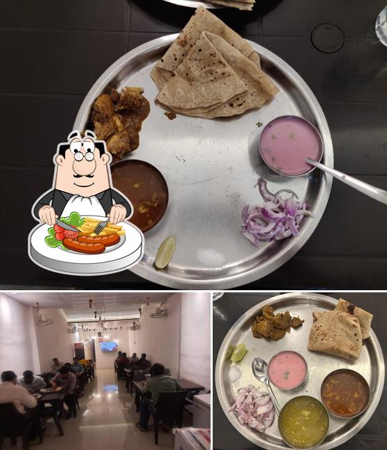 This is the picture showing food and interior at Hotel Sawant Kitchen
