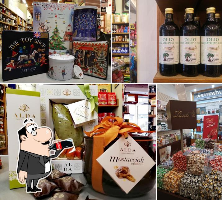 Dai un’occhiata alla immagine che presenta la bevanda e cibo di EnoDrogheria F.lli Latartara