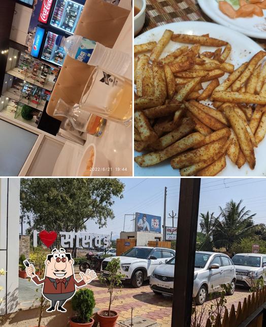 The photo of food and exterior at Sai Palace Family Restaurant & Bar Lodging
