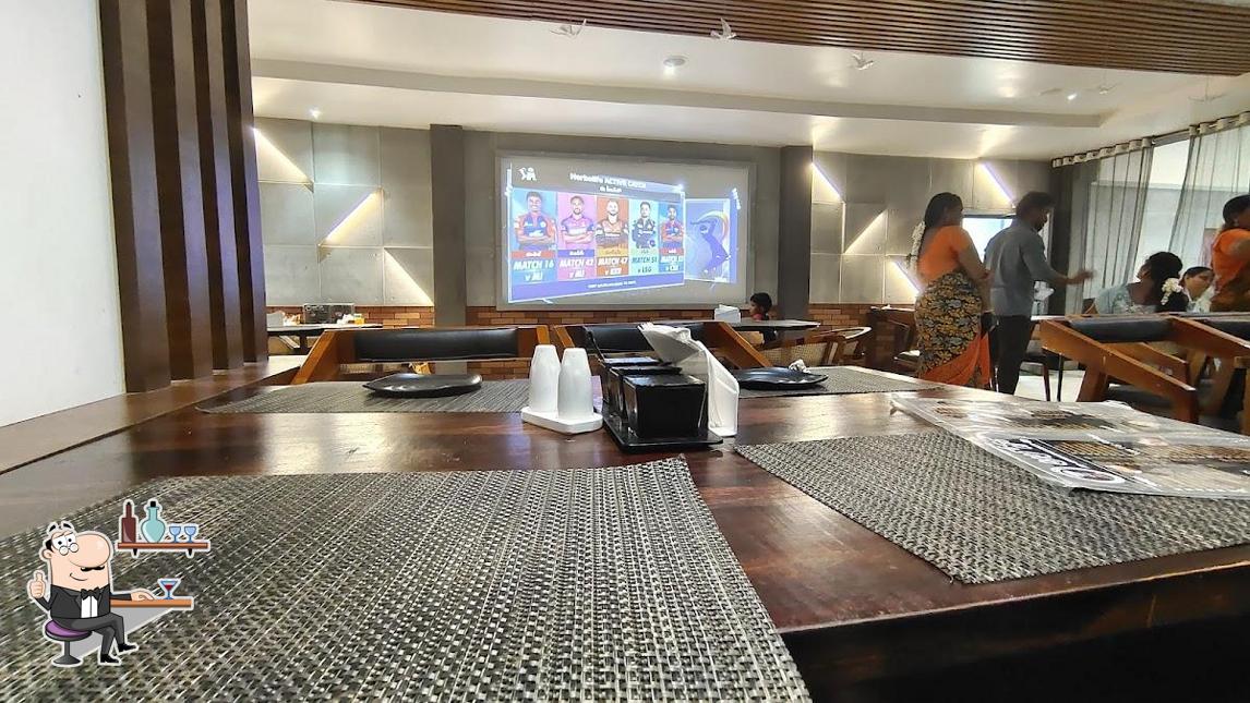 Take a seat at one of the tables at Aloha Restaurant & Lodge