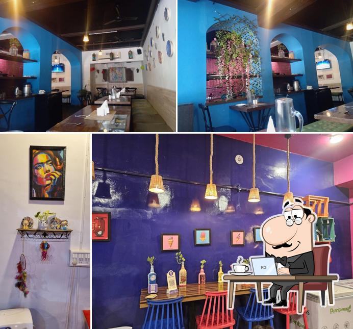 Take a seat at one of the tables at ScoopTown - The Ice Cream Cafe