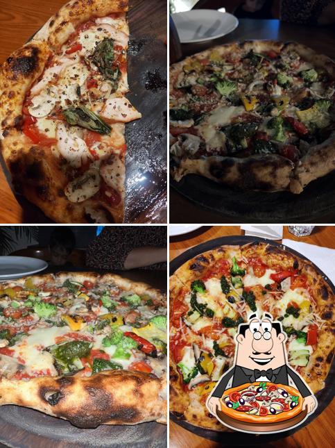 Try out pizza at Rojo Tomate