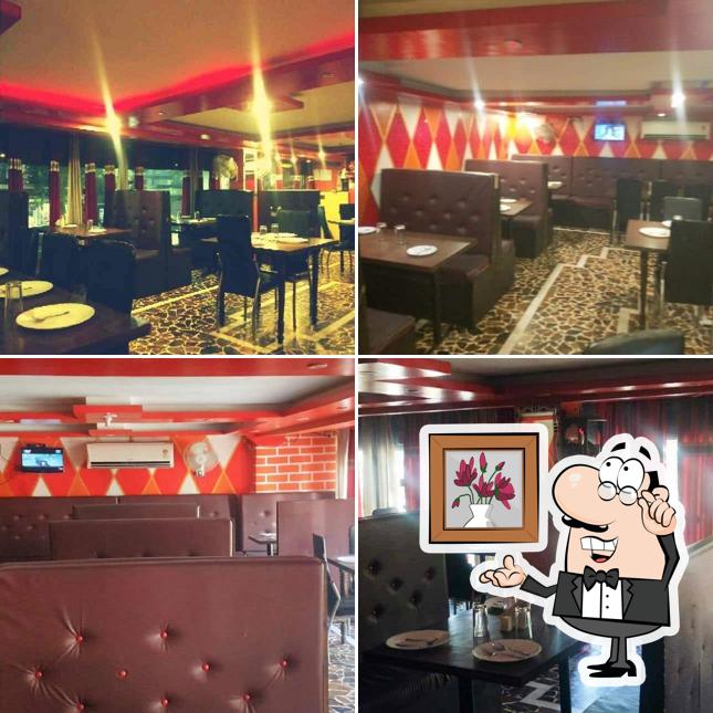 Take a seat at one of the tables at Shiva Red Chilli Restaurant