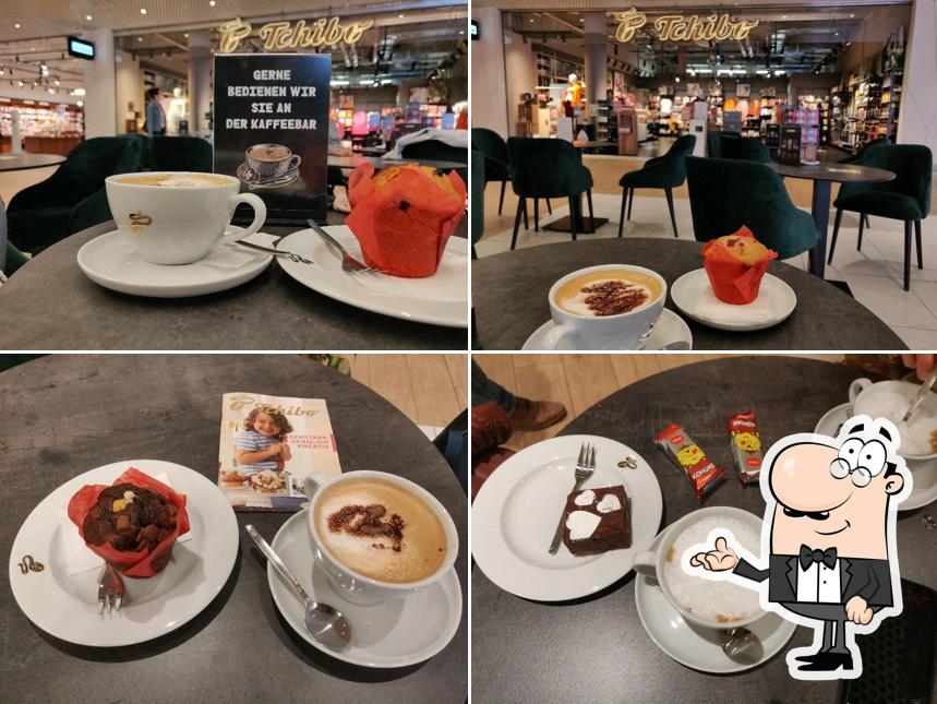 Siediti a un tavolo di Tchibo Filiale und Kaffeebar