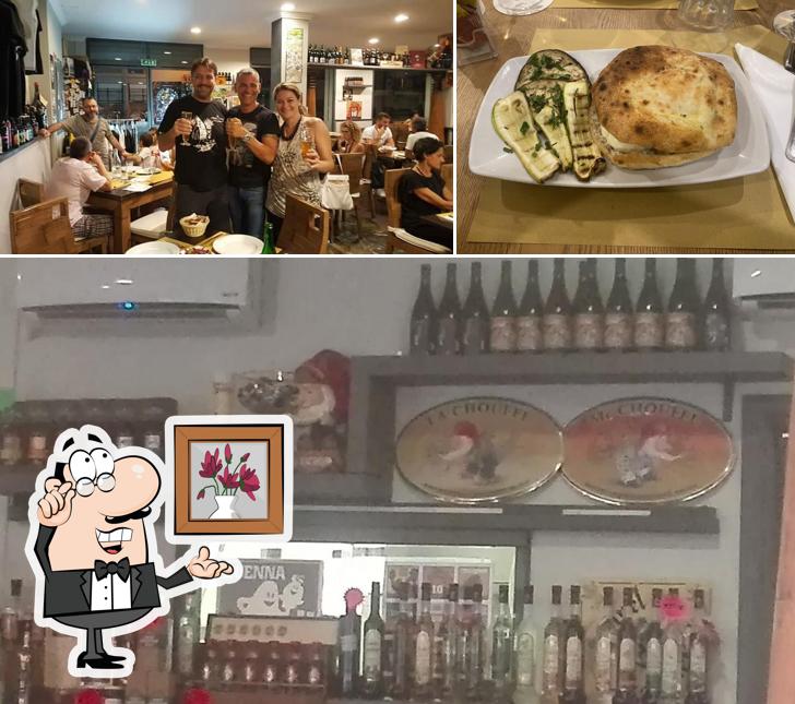 Siediti a un tavolo di Pizza Margherita Risto Pub