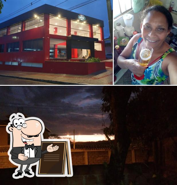 A ilustração da exterior e bebida no Padaria Antony