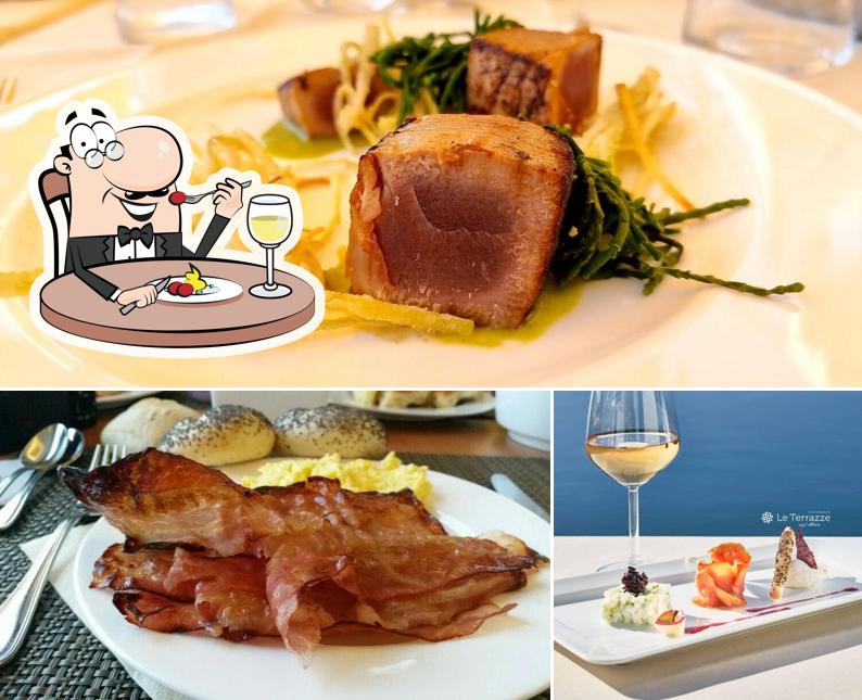 Tra le varie cose da Ristorante Le Terrazze si possono trovare la cibo e vino