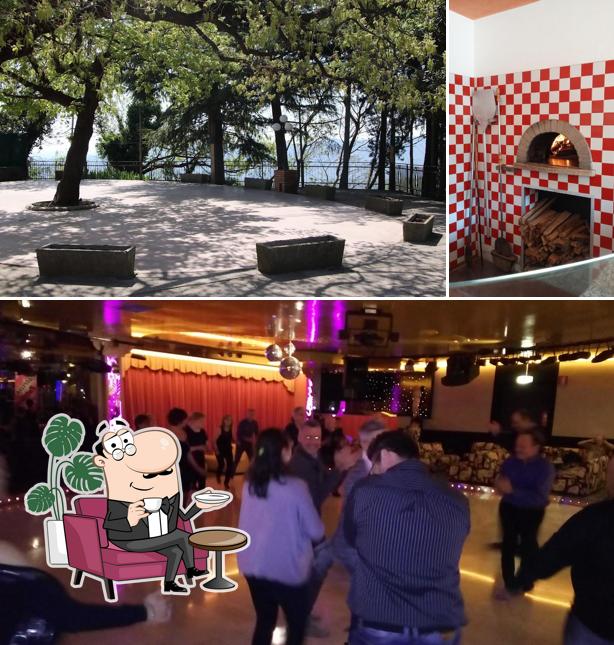 Dai un'occhiata agli interni di Trattoria e Pizzeria Mocambo