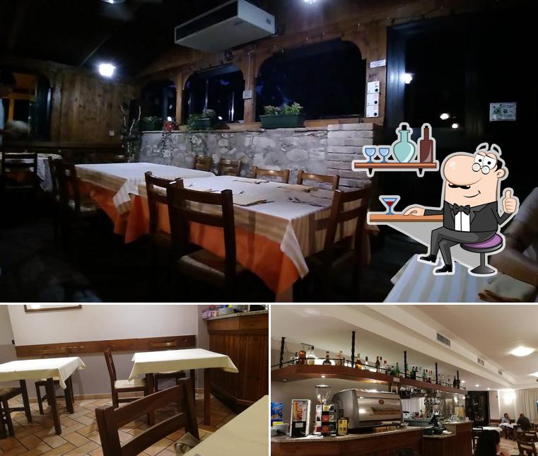 Siediti a un tavolo di Hotel Ristorante Pizzeria Bellavista