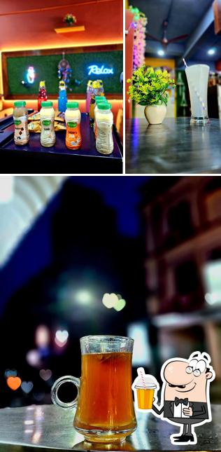 Enjoy a beverage at Karupatti Raja chrompet