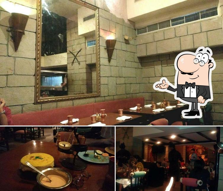 Take a seat at one of the tables at Samarkand