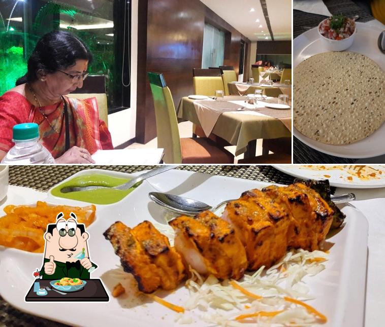 Among different things one can find food and interior at Modak Restaurant (By Hotel Atharva)