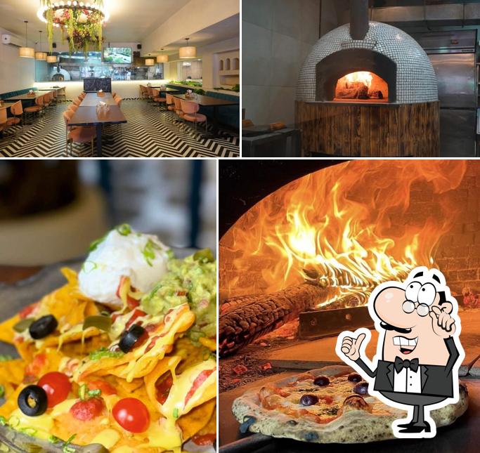 The picture of interior and food at La merito charcoal pizza and cafe