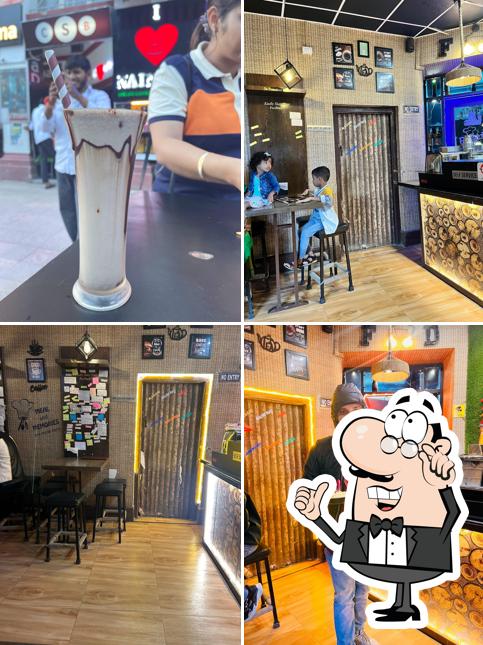Take a seat at one of the tables at Chai Sutta Bar