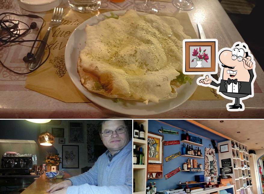 Questa è la immagine che raffigura la interni e cibo di Il Timone