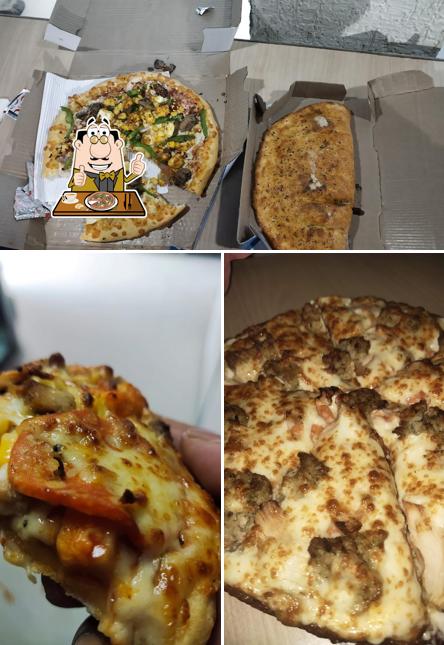 Try out pizza at Domino's Pizza High School Colony, Kohima