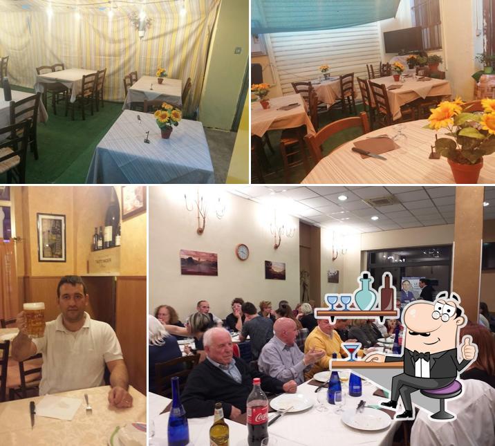 Siediti a un tavolo di Pizzeria Trattoria Sichi Giuliano