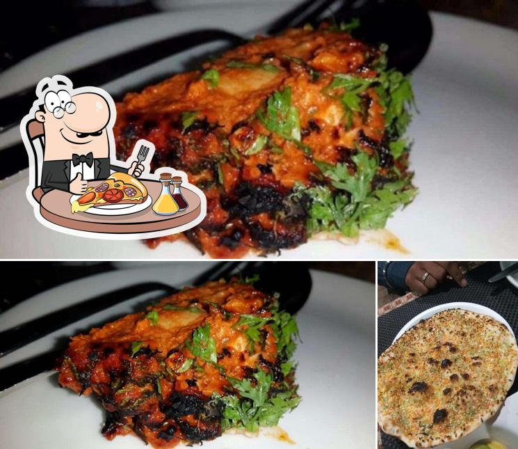 Get pizza at Trushna Garden Veg Restaurant