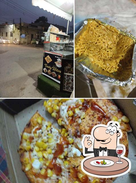 Check out the image showing food and exterior at Tasty Bites