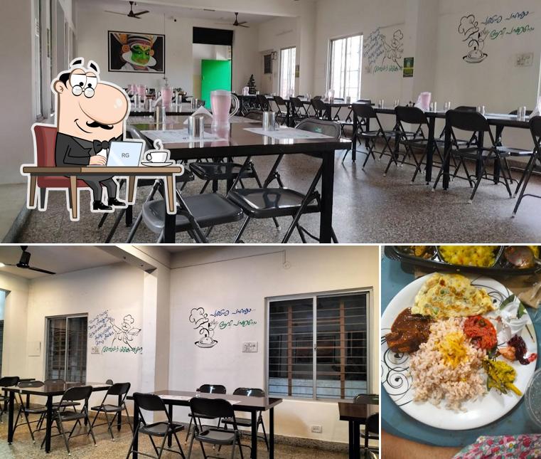 Take a seat at one of the tables at Kaippunnyam Kerala Restaurant