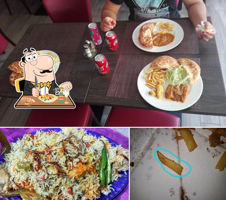 Dai un’occhiata alla foto che raffigura la cibo e tavolo da pranzo di pizzeria Bella Italia Trento