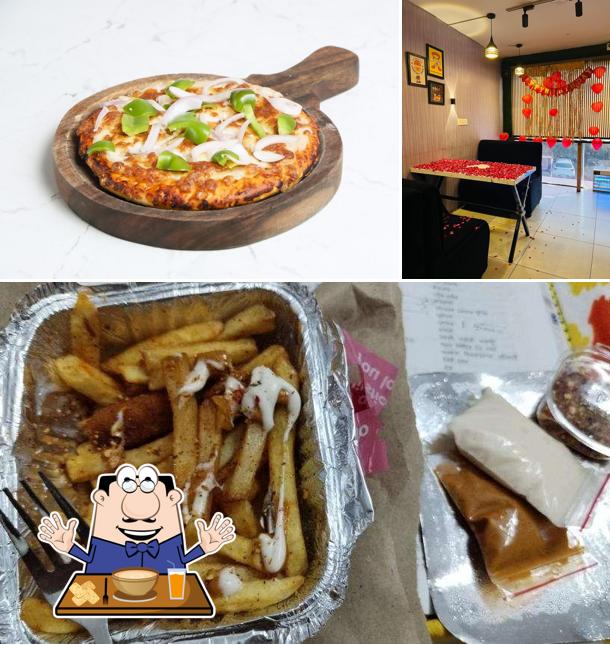 Check out the photo displaying food and interior at Gup shup house