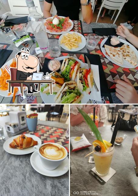 Dai un'occhiata agli interni di New Gi Bar Pizzeria
