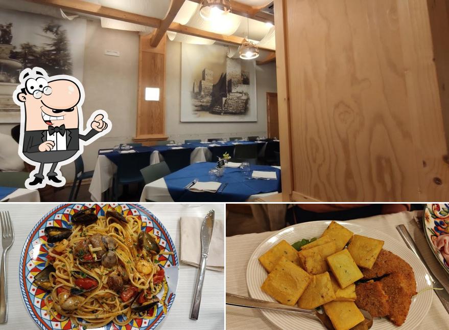 Questa è la immagine che mostra la interni e cibo di La Trinacria Ristorante Trattoria Pizzeria