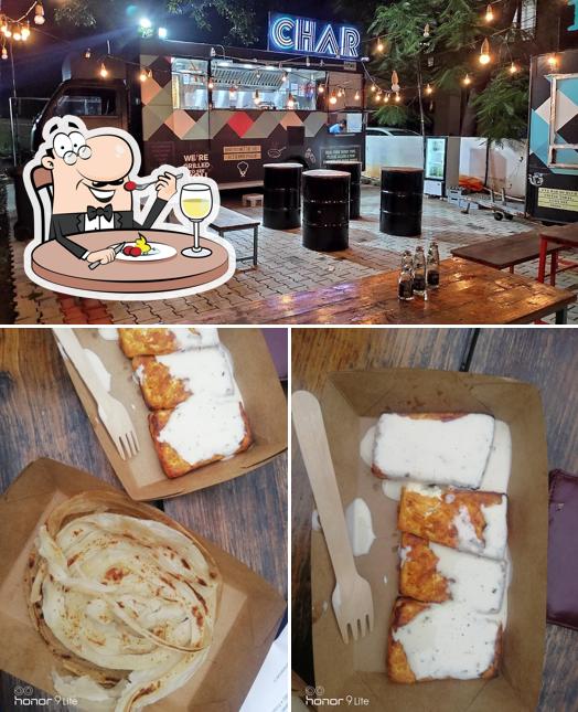 This is the image depicting food and interior at Char - Food Truck